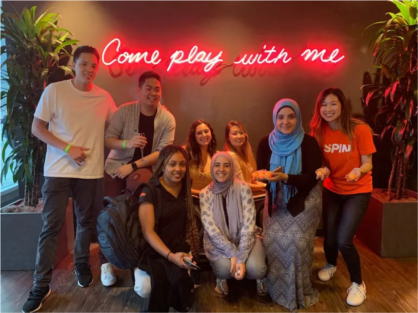 Some members of the Spin team posing for a photograph